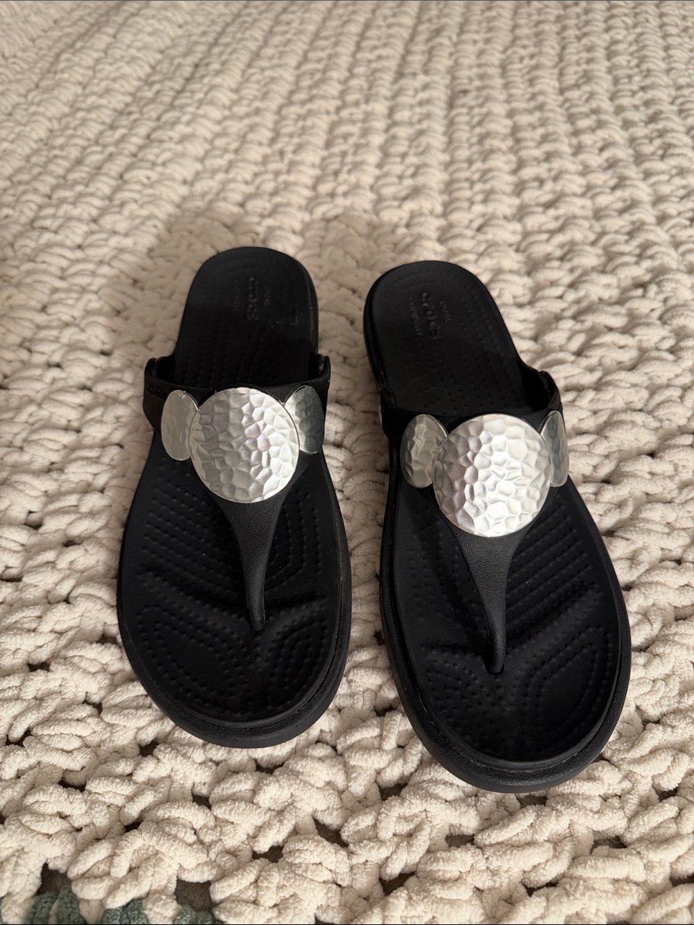 CROCS Black Thong Sandals with Silver Hammered Discs